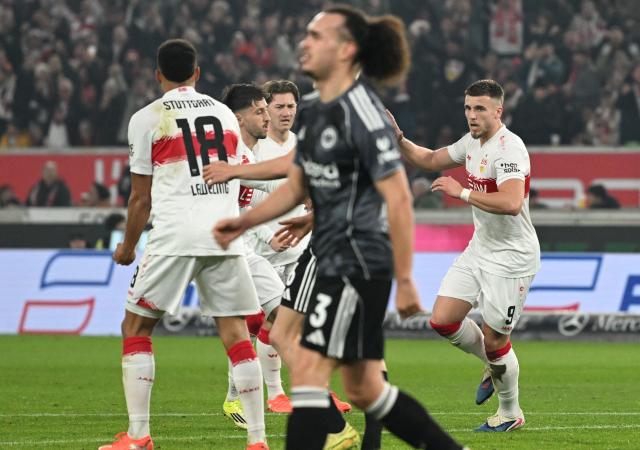 Stuttgart's Bosnian forward #09 Ermedin Demirovic celebrates after scoring the equalising goal 1:1 during the German first division Bundesliga football match between VfB Stuttgart and Eintracht Frankfurt in Stuttgart, southern Germany, on January 13, 2026. (Photo by THOMAS KIENZLE / AFP) / DFL REGULATIONS PROHIBIT ANY USE OF PHOTOGRAPHS AS IMAGE SEQUENCES AND/OR QUASI-VIDEO