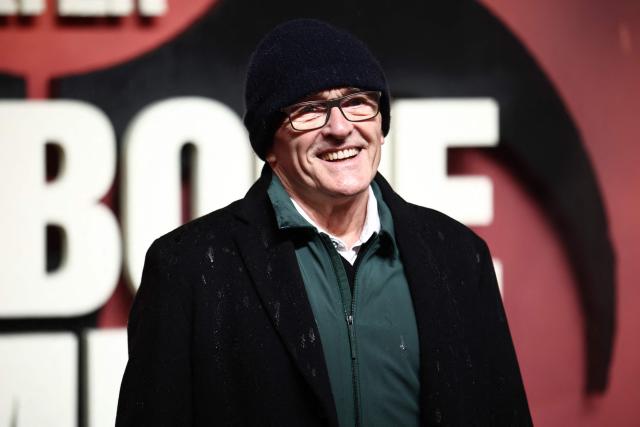British producer Danny Boyle poses on the red carpet upon arrival to attend the world premiere of "28 Years Later: The Bone Temple" at the BFI IMAX in London, on January 13, 2026. (Photo by Henry NICHOLLS / AFP)