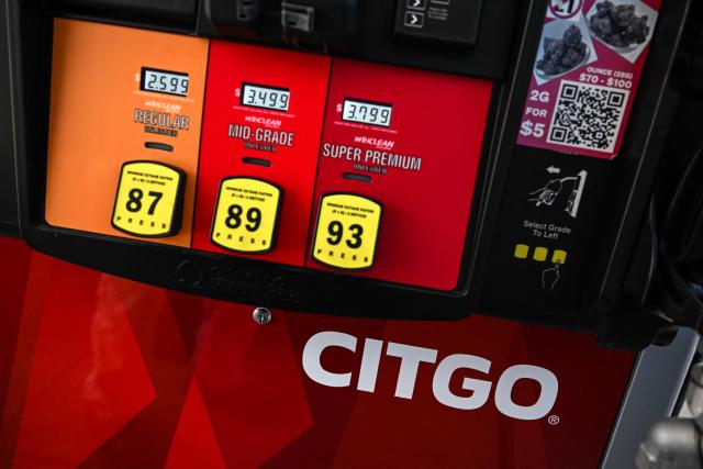 (FILES) Gas pumps are seen at a CITGO gas station in Houston, Texas, on December 2, 2025. Opposition-appointed board of Venezuela's state oil company PDVSA said on January 13, 2026, that it had appealed the sale of its US subsidiary Citgo over "serious conflicts of interest" in an auction process that benefited creditors and still required US government approval. (Photo by RONALDO SCHEMIDT / AFP)