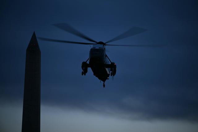 Marine One carrying US President Donald Trump comes in to land at the White House in Washington, DC, on January 13, 2026. Trump traveled to Detroit, Michigan, to speak to the Detroit Economic Club and visit a Ford production plant. (Photo by Brendan SMIALOWSKI / AFP)