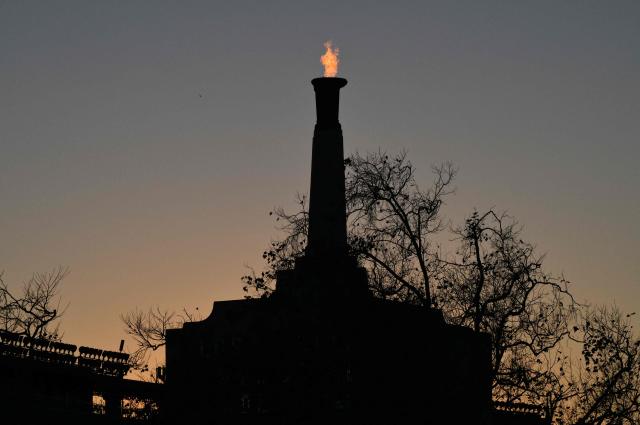 The LA28 Olympic cauldron is lit after a ceremonial lighting at the Memorial Coliseum in Los Angeles on January 13, 2026, ahead of the launch of ticket registration for the 2028 Summer Olympic Games. (Photo by Frederic J. Brown / AFP)