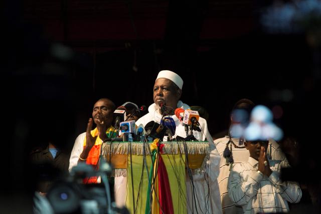 (FILES) Imam Mahmoud Dicko delivers a speech during a ceremony hosted by him and his organization, CMAS (Coordination of movements and associations sympathetic to Imam Mahmoud Dicko), in Bamako on August 28, 2020, in honor of the Malians killed by security forces on July 10-12 during ongoing protests against Ibrahim Boubacar Keita, who was ousted by the Malian military on August 18th. With Malian Imam in exile Mahmoud Dicko's new movement, the Coalition of Forces for the Republic (CFR), this key figure in Mali, at the crossroads of religion and politics, aims to re-establish dialogue between the various parties and overthrow the military, which has been in power since a double coup in 2020 and 2021. (Photo by ANNIE RISEMBERG / AFP)