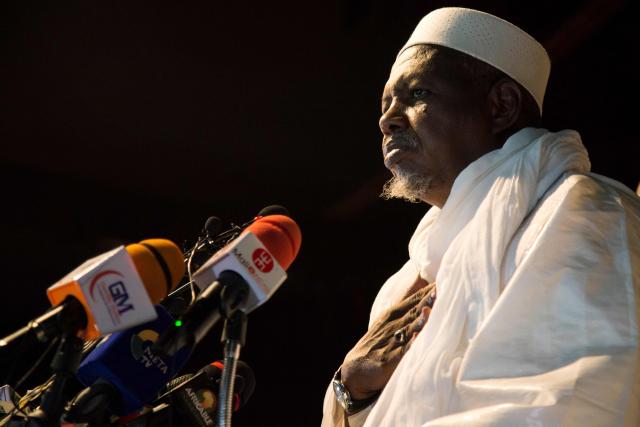 (FILES) Imam Mahmoud Dicko delivers a speech during a ceremony hosted by him and his organization, CMAS (Coordination of movements and associations sympathetic to Imam Mahmoud Dicko), in Bamako on August 28, 2020, in honor of the Malians killed by security forces on July 10-12 during ongoing protests against Ibrahim Boubacar Keita, who was ousted by the Malian military on August 18th. With Malian Imam in exile Mahmoud Dicko's new movement, the Coalition of Forces for the Republic (CFR), this key figure in Mali, at the crossroads of religion and politics, aims to re-establish dialogue between the various parties and overthrow the military, which has been in power since a double coup in 2020 and 2021. (Photo by ANNIE RISEMBERG / AFP)