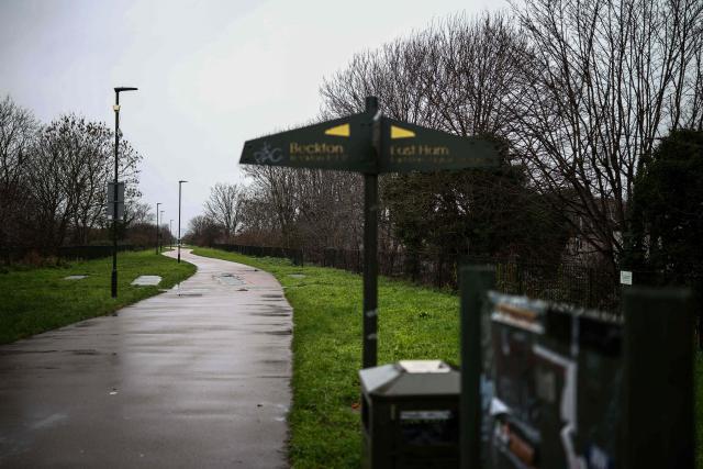 The junction of Greenway and High Street South is pictured in East Ham, east London on January 13, 2026, where baby Elsa was found in January 2024. Two years after a newborn baby was found abandoned on a freezing winter's night, London police look set to shelve their probe despite discovering she is the full sibling of two other foundlings. Elsa, named by Hospital staff, after the character in the Disney film "Frozen" is believed to have been less than an hour old when she was discovered in a shopping bag on a bleak pathway near a busy east London road on January 18, 2024. Her siblings were abandoned nearby in similar circumstances, Harry in 2017 and Roman in 2019. Police warned that they could not "discount" the possibility of a fourth child in future who "may not be so fortunate as Elsa and her siblings". (Photo by HENRY NICHOLLS / AFP) / TO GO WITH AFP STORY Britain-social-children-police,FOCUS by Helen ROWE