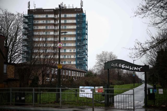 A residential building is pictured near to Balaam Street in east London on January 13, 2026, where baby Harry was found in September 2017. Two years after a newborn baby was found abandoned on a freezing winter's night, London police look set to shelve their probe despite discovering she is the full sibling of two other foundlings. Elsa, named by Hospital staff, after the character in the Disney film "Frozen" is believed to have been less than an hour old when she was discovered in a shopping bag on a bleak pathway near a busy east London road on January 18, 2024. Her siblings were abandoned nearby in similar circumstances, Harry in 2017 and Roman in 2019. Police warned that they could not "discount" the possibility of a fourth child in future who "may not be so fortunate as Elsa and her siblings". (Photo by HENRY NICHOLLS / AFP) / TO GO WITH AFP STORY Britain-social-children-police,FOCUS by Helen ROWE