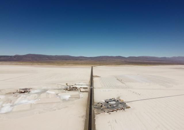 (FILES) (FILES) Aerial view of a salt mining site (L) and a parking area in the Salinas Grandes salt flat in the northern province of Jujuy, Argentina, taken on October 18, 2022. The Copernicus Institute releases its report on world temperatures on January 14, 2026. (Photo by Martín SILVA / AFP)