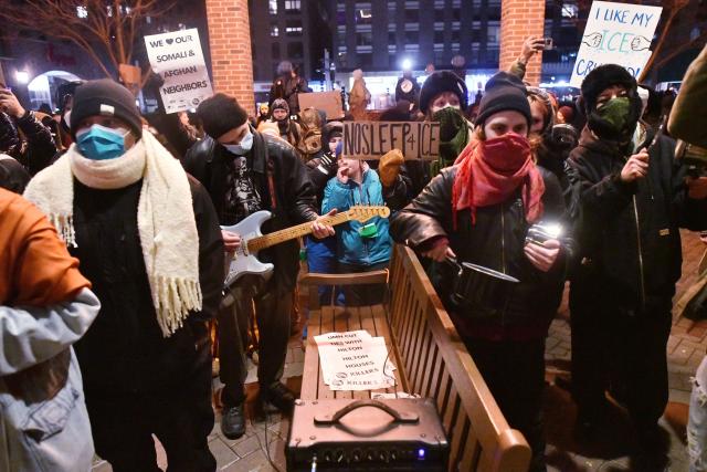 Anti-ICE demonstrators protest outside the Graduate Hotel where federal immigration agents are believed to be staying in Minneapolis, Minnesota on January 13, 2026. Hundreds more federal agents were heading to Minneapolis, the US homeland security chief said on January 11, brushing aside demands by the Midwestern city's Democratic leaders to leave after an immigration officer fatally shot a woman protester. In multiple TV interviews, US Homeland Secretary Kristi Noem defended the actions of the officer who shot and killed 37-year-old Renee Nicole Good, whose death has sparked renewed protests nationwide against President Donald Trump's immigration crackdown. (Photo by Octavio JONES / AFP)