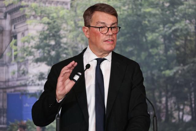 Deputy Mayor of Paris, Patrick Bloche delivers a speech as part of the 2026 whishes at Paris City Hall, in central Paris on January 14, 2026. (Photo by Thomas SAMSON / AFP)