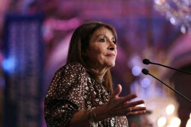 Paris' Mayor Anne Hidalgo gestures as she delivers a speech for the 2026 whishes at Paris City Hall, in central Paris on January 14, 2026. (Photo by Thomas SAMSON / AFP)