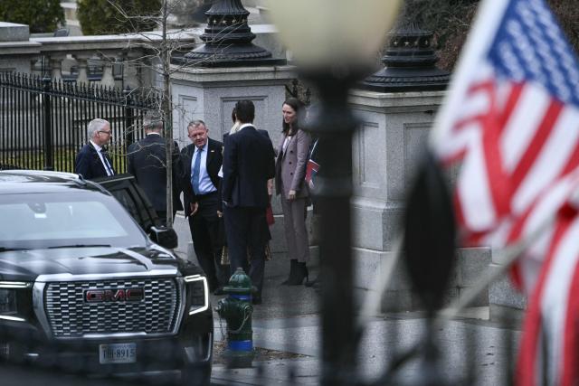 Danish Foreign Minister Lars Løkke Rasmussen (center L) departs the Eisenhower Executive Office Building on the White House campus following a meeting with US Secretary of State Marco Rubio and US Vice President JD Vance, in Washington, DC, on January 14, 2026. US President Donald Trump insisted Wednesday the US needs to take control of Greenland, with NATO's support, just hours before talks about the Arctic island with top Danish, Greenlandic and US officials. (Photo by Brendan SMIALOWSKI / AFP)