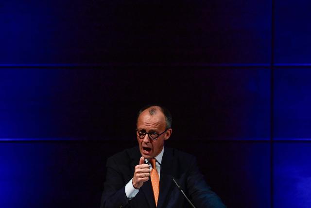 German Chancellor Friedrich Merz addresses the New Year’s reception of Halle's Chamber of Commerce and Industry in Halle,eastern Germany on January 14, 2026. (Photo by John MACDOUGALL / AFP)