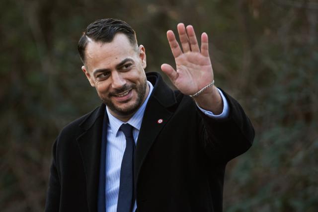 French leftist party La France Insoumise (LFI) member of Parliament and mayoral candidate for the 2026 municipal elections of Marseille Sebastien Delogu waves after taking part in a "Toxic Tour", a day of action called by LFI to bring awareness on pollution and risks linked to disaffected industrial sites, in Marseille on January 14, 2026. (Photo by MIGUEL MEDINA / AFP)
