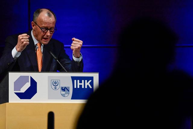 German Chancellor Friedrich Merz addresses the New Year’s reception of Halle's Chamber of Commerce and Industry in Halle,eastern Germany on January 14, 2026. (Photo by John MACDOUGALL / AFP)