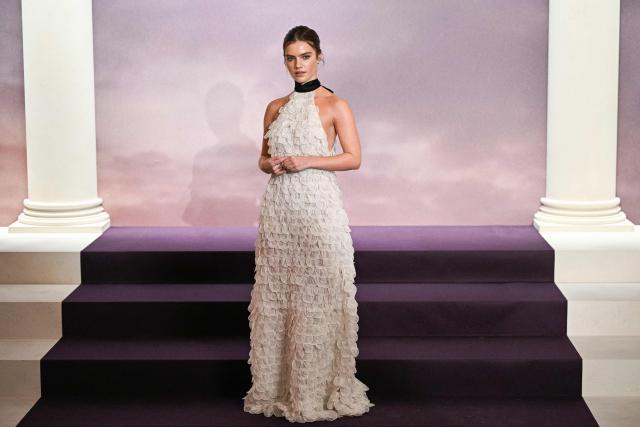 British actress Florence Hunt arrives for the World premiere of "Bridgerton Season 4" at the Palais Brongniart in Paris on January 14, 2026. (Photo by JULIEN DE ROSA / AFP)