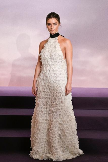 British actress Florence Hunt arrives for the World premiere of "Bridgerton Season 4" at the Palais Brongniart in Paris on January 14, 2026. (Photo by JULIEN DE ROSA / AFP)