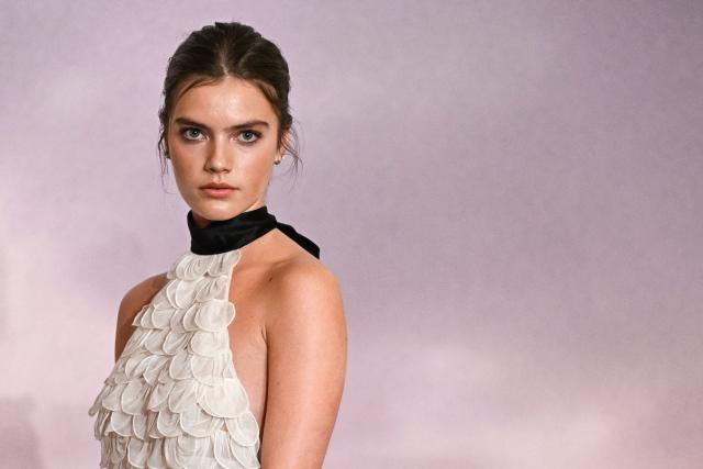 British actress Florence Hunt arrives for the World premiere of "Bridgerton Season 4" at the Palais Brongniart in Paris on January 14, 2026. (Photo by JULIEN DE ROSA / AFP)