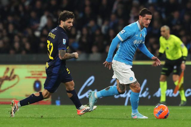 Napoli's Italian defender #30 Pasquale Mazzocchi (R) fights for the ball with Parma's Italian forward #32 Patrick Cutrone during the Italian Serie A football match between Napoli and Parma at the Diego Armando Maradona Stadium in Naples on January 14, 2026. (Photo by CARLO HERMANN / AFP)