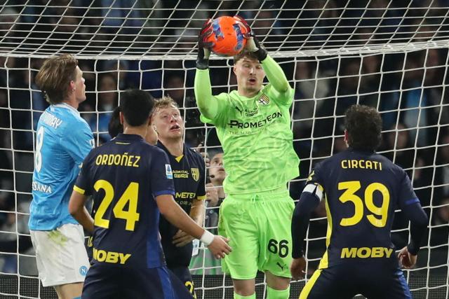 Parma's Italian goalkeeper #66 Filippo Rinaldi blocks the ball during the Italian Serie A football match between Napoli and Parma at the Diego Armando Maradona Stadium in Naples on January 14, 2026. (Photo by CARLO HERMANN / AFP)