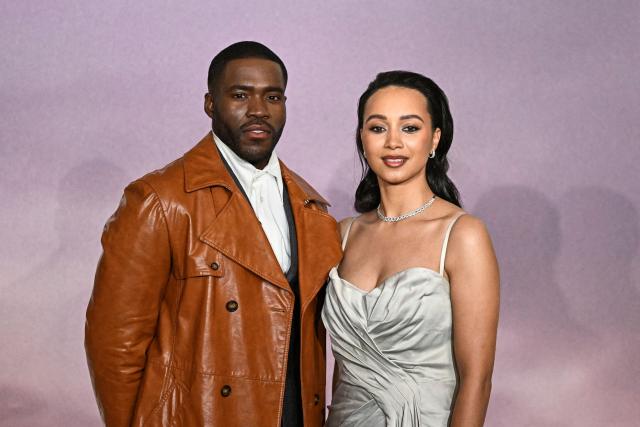 British-Nigerian actor Martins Imhangbe and British actress Emma Naomi arrive for the World premiere of "Bridgerton Season 4" at the Palais Brongniart in Paris on January 14, 2026. (Photo by JULIEN DE ROSA / AFP)