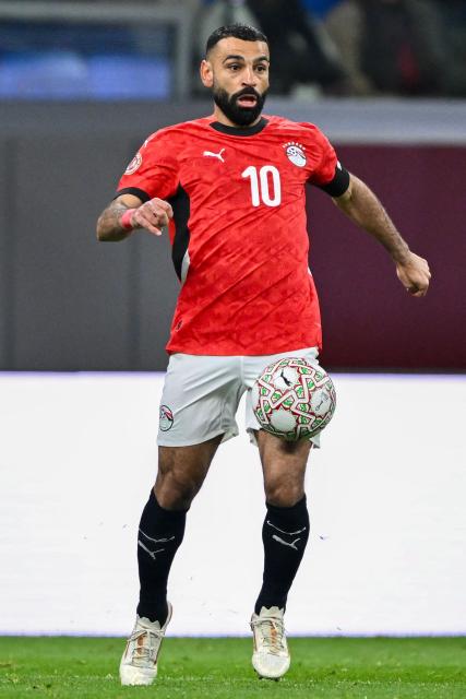Egypt's forward #10 Mohamed Salah controls the ball during the Africa Cup of Nations (CAN) semi-final football match between Senegal and Egypt at the Grand stadium in Tangiers on January 14, 2026. (Photo by SEBASTIEN BOZON / AFP)