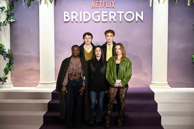 (From L) Participants of France's reality television show "Star Academy" Sarah N'Dri Youetto, Bastiaan Van Leeuwen, Ambre Jadah, Victor Aupecle, Lea Doffey arrive for the World premiere of "Bridgerton Season 4" at the Palais Brongniart in Paris on January 14, 2026. (Photo by JULIEN DE ROSA / AFP)