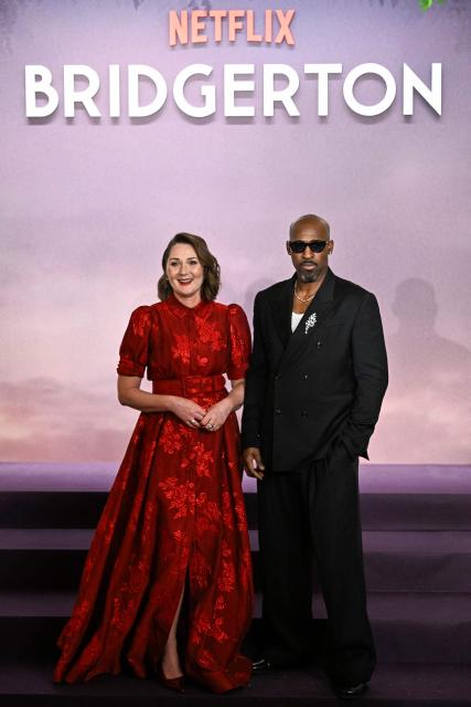 British actress Ruth Gemmell and British actor Daniel Francis arrives for the World premiere of "Bridgerton Season 4" at the Palais Brongniart in Paris on January 14, 2026. (Photo by JULIEN DE ROSA / AFP)