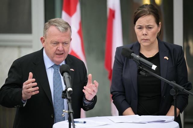 (L/R) Danish Foreign Minister Lars Løkke Rasmussen and Greenland's Foreign Minister Vivian Motzfeldt speak during a news conference at the Danish Embassy in Washington, DC, on January 14, 2026. Denmark and Greenland's top diplomats held high-stakes talks at the White House on Wednesday, with President Donald Trump warning it was "vital" for the United States to take control of the Arctic island. (Photo by Oliver Contreras / AFP)
