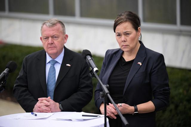 Danish Foreign Minister Lars Løkke Rasmussen and Greenland's Foreign Minister Vivian Motzfeldt speak during a news conference at the Danish Embassy in Washington, DC, on January 14, 2026. Denmark and Greenland's top diplomats held high-stakes talks at the White House on Wednesday, with President Donald Trump warning it was "vital" for the United States to take control of the Arctic island. (Photo by Oliver Contreras / AFP)