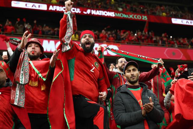 Morocco's supporters cheer before the Africa Cup of Nations (CAN) semi-final football match between Nigeria and Morocco at the Prince Moulay Abdellah stadium in Rabat on January 14, 2026. (Photo by Franck FIFE / AFP)