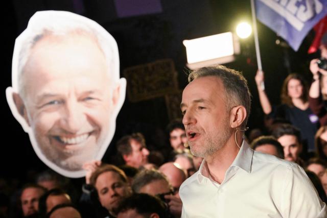 Socialistes et Apparentes' MP and candidate for mayor in Paris Emmanuel Gregoire gestures as he delivers a speech during a meeting of the united left at La Bellevilloise in Paris on January 14, 2026. Socialistes et Apparentes' MP Emmanuel Gregoire, candidate for the united left, outside La France Insoumise party, in the municipal elections to be held on March 15 and 22, 2026, holds his first campaign rally. (Photo by Martin LELIEVRE / AFP)