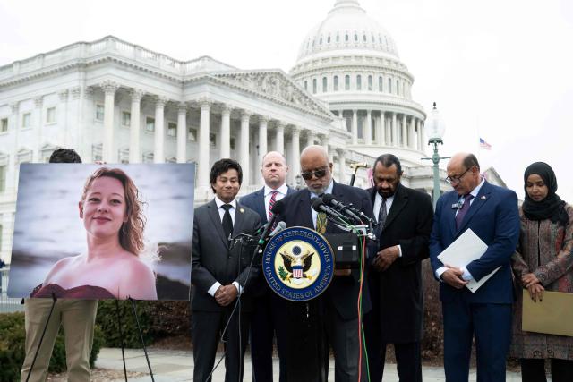 US Representative Bennie Thompson (C), Democrat of Mississippi, and fellow Democrats hold a moment of silence along a photograph of Renee Good, who was killed last week by ICE agents in Minnesota, during a press conference calling for accountability by the Department of Homeland Security outside the US Capitol in Washington, DC, on January 14, 2026. (Photo by SAUL LOEB / AFP)