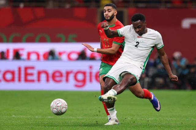 Morocco's midfielder #11 Ismael Saibari and Nigeria's defender #02 Bright Osayi-Samuel fight for the ball during the Africa Cup of Nations (CAN) semi-final football match between Nigeria and Morocco at the Prince Moulay Abdellah stadium in Rabat on January 14, 2026. (Photo by FRANCK FIFE / AFP)