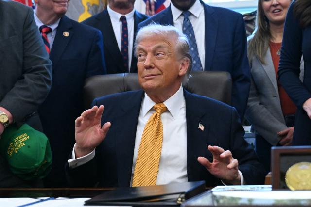 US President Donald Trump speaks before signing a bill in the Oval Office of the White House in Washington, DC, on January 14, 2026. (Photo by Brendan SMIALOWSKI / AFP)