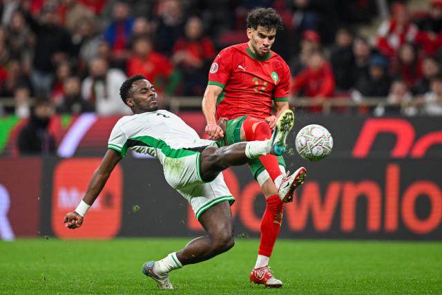 Nigeria's defender #02 Bright Osayi-Samuel and Morocco's midfielder #17 Abde Ezzalzouli vie during the Africa Cup of Nations (CAN) semi-final football match between Nigeria and Morocco at the Prince Moulay Abdellah stadium in Rabat on January 14, 2026. (Photo by Paul ELLIS / AFP)