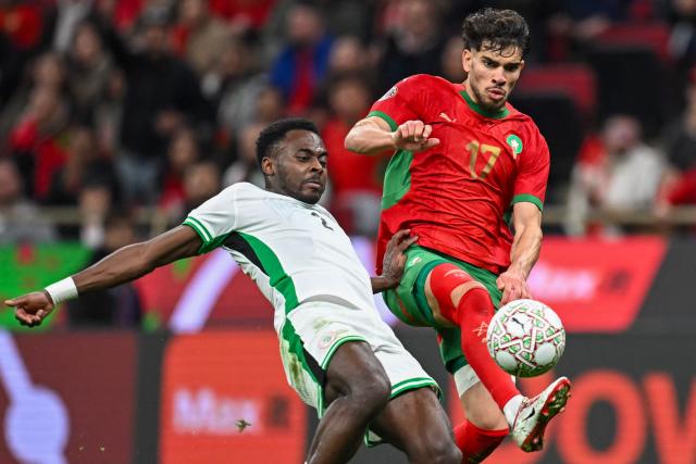 Nigeria's defender #02 Bright Osayi-Samuel and Morocco's midfielder #17 Abde Ezzalzouli vie during the Africa Cup of Nations (CAN) semi-final football match between Nigeria and Morocco at the Prince Moulay Abdellah stadium in Rabat on January 14, 2026. (Photo by Paul ELLIS / AFP)