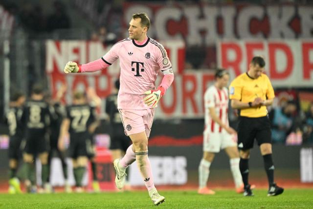 Bayern Munich's German goalkeeper #01 Manuel Neuer celebrates after the German first division Bundesliga football match between FC Cologne and FC Bayern Munich in Cologne, western Germany on January 14, 2026. (Photo by INA FASSBENDER / AFP) / DFL REGULATIONS PROHIBIT ANY USE OF PHOTOGRAPHS AS IMAGE SEQUENCES AND/OR QUASI-VIDEO