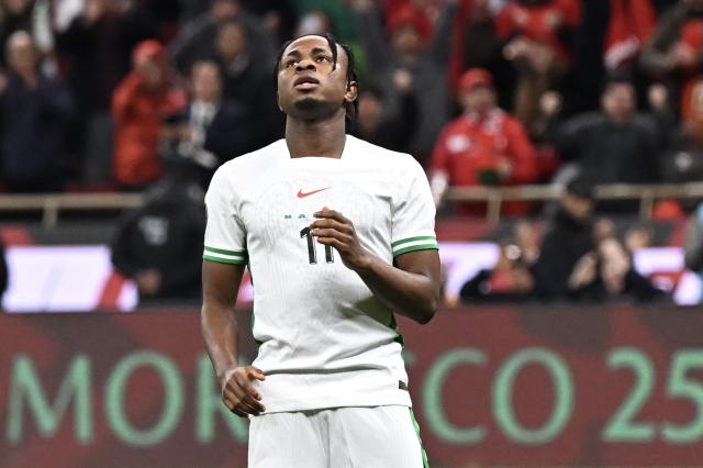 Nigeria's forward #11 Samuel Chukwueze reacts after missing a penalty during the Africa Cup of Nations (CAN) semi-final football match between Nigeria and Morocco at the Prince Moulay Abdellah stadium in Rabat on January 14, 2026. (Photo by Paul ELLIS / AFP)