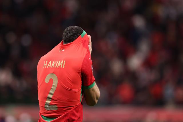 Morocco's defender #02 Achraf Hakimi reacts after winning the Africa Cup of Nations (CAN) semi-final football match between Nigeria and Morocco at the Prince Moulay Abdellah stadium in Rabat on January 14, 2026. (Photo by FRANCK FIFE / AFP)