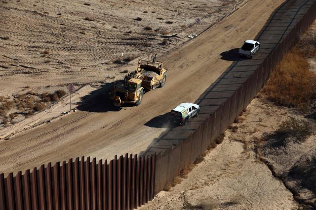 Aerial view of an US Border Patrol pickup bext to the wall being constructed at the US-Mexico border in Santa Teresa, New Mexico, US, as seen from Ciudad Juarez, Chihuahua state, Mexico on January 14, 2026. (Photo by Herika Martinez / AFP)