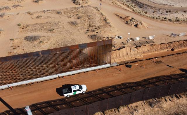 Aerial view of an US Border Patrol pickup bext to the wall being constructed at the US-Mexico border in Santa Teresa, New Mexico, US, as seen from Ciudad Juarez, Chihuahua state, Mexico on January 14, 2026. (Photo by Herika Martinez / AFP)