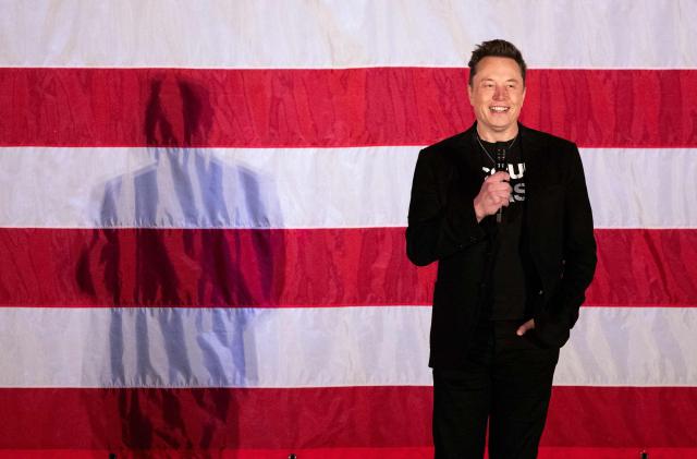 (FILES) Tesla and SpaceX CEO Elon Musk speaks during a town hall event hosted by America PAC in support of former US President and Republican presidential candidate Donald Trump at the Greater Philadelphia Expo Center in Oaks, Pennsylvania, on October 18, 2024. Elon Musk's platform X on January 14, 2026 announced measures to prevent its AI chatbot Grok from undressing images of real people, following global backlash over its generation of sexualized images of women and children. (Photo by RYAN COLLERD / AFP)
