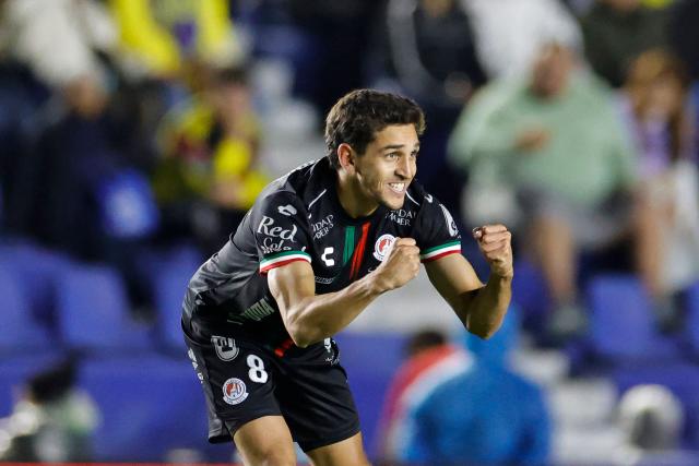 San Luis' Uruguayan midfielder #08 Juan Manuel Sanabria celebrates after scoring the opening goal during the Liga MX Clausura tournament football match between America and San Luis at the Azteca Stadium in Mexico City on January 14, 2026. (Photo by Rodrigo Oropeza / AFP)
