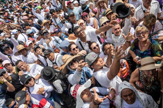 Faithfuls attend the annual procession of Divina Pastora in Barquisimeto, Venezuela on January 14, 2026. (Photo by Maryorin Mendez / AFP)