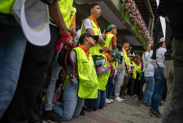 Faithfuls attend the annual procession of Divina Pastora in Barquisimeto, Venezuela on January 14, 2026. (Photo by Maryorin Mendez / AFP)
