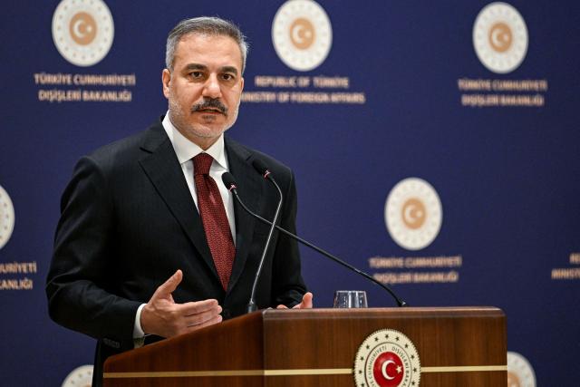 Turkish Minister of Foreign Affairs Hakan Fidan addresses the audience during a press briefing meeting to review the past year and to share insights regarding regional and global developments in Istanbul, on January 15, 2026. Turkey's top diplomat called on January 15, 2026 for dialogue to the crisis in Iran, rocked by mass protests which rights group say have left thousands dead and which prompted US warnings to Tehran. (Photo by Ozan KOSE / AFP)
