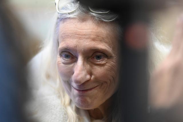 French lawyer Isabelle Steyer for Chloe P. looks on as she leaves the courthouse following the trial of Chloe P's ex-companion tried for attempted murder on Chloe P. before the Loir-et-Cher Assize Courthouse in Blois, central France on January 15, 2026, after he violently attacked her in December 2022. On December 13, 2022, the young woman, then 24 years old, went to the Blois police station to file a complaint against her ex-partner. But on the spot, Chloé P., a manager in a pizzeria, was invited by the police officer to come back the next day. She was found two hours later by the police, alerted by neighbors, left for dead in a pool of blood, in the middle of the common areas of her building. (Photo by JEAN-FRANCOIS MONIER / AFP)
