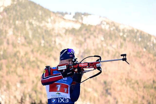 Norway's Johannes Dale-Skjedval warms up at the shooting range prior to the men's 4x7,5km relay competition of the IBU Biathlon World Cup in Ruhpolding, southern Germany on January 15, 2026. (Photo by Tobias SCHWARZ / AFP)