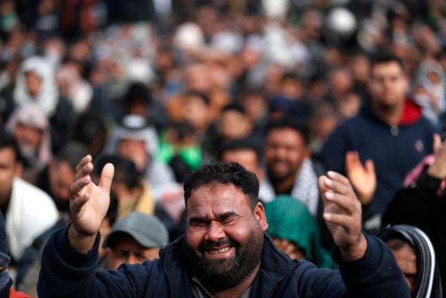 A Shiite Muslim pilgrim prays inside the shrine of the 8th-century Imam Musa al-Kadhim, during the annual commemoration of his death on 25 Rajab according to the Muslim Hijri calendar, in the Kadhimiya district of northern Baghdad on January 15, 2026. Pilgrims from various Iraqi provinces annually undertake a march on foot to reach the shrine to commemorate the death of Imam Kadhim, who is believed to have been poisoned by agents of the ruling Abbasid caliph Harun al-Rashid. (Photo by AHMAD AL-RUBAYE / AFP)
