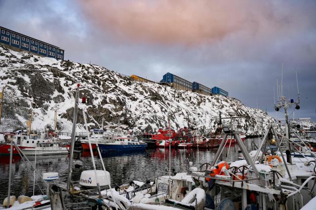 Fishing vessels are moored in the harbour in Nuuk, Greenland, on January 15, 2026. Denmark's prime minister said on January 15, 2026 that the US ambition to take control of Greenland remained "intact" and that there were still a "fundamental disagreement" between the countries, despite high-stakes White House talks. (Photo by Alessandro Rampazzo / AFP)