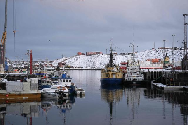 Fishing vessels are moored in the harbour in Nuuk, Greenland, on January 15, 2026. Denmark's prime minister said on January 15, 2026 that the US ambition to take control of Greenland remained "intact" and that there were still a "fundamental disagreement" between the countries, despite high-stakes White House talks. (Photo by Alessandro Rampazzo / AFP)